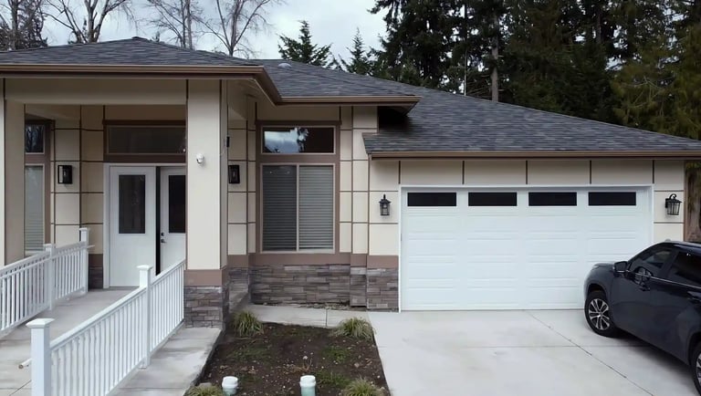 Adult family home with modern amenities including bedrooms, kitchen, accessible bathrooms, and cozy living areas.