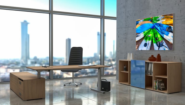 a modern office desk with a large window and a view of a city