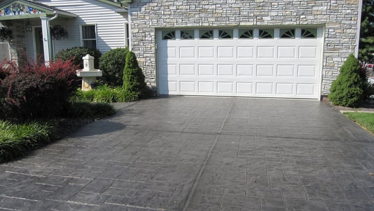 Dark gray stamped concrete driveway in Columbia, SC