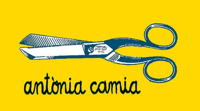 a pair of scissors and scissors on a yellow background