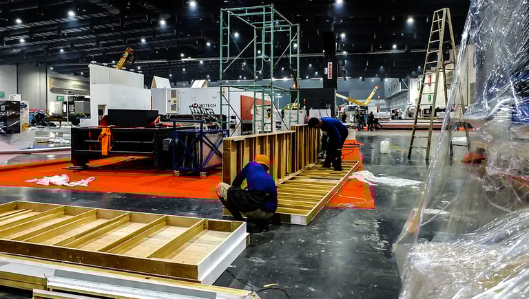 Staff working on setting up event production 