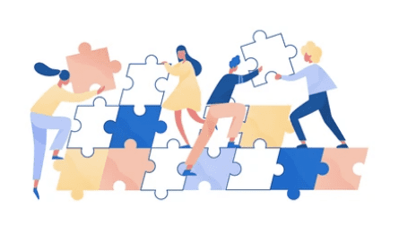 people are standing around a puzzle piece of puzzle pieces