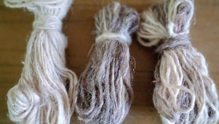 Hand-carded and hand-spun Tibetan Highland heathered wool for artisanal rug weaving