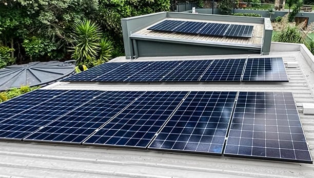 Residential rooftop solar panel installation for renewable energy and sustainable home power.