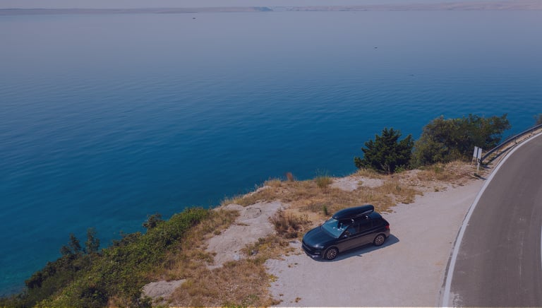 Algarve coastal road with private transfer vehicle