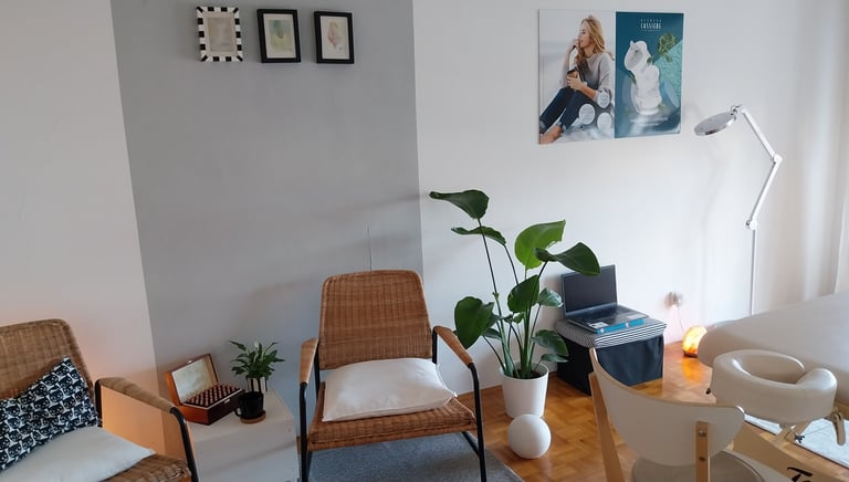 a living room with a chair and a table