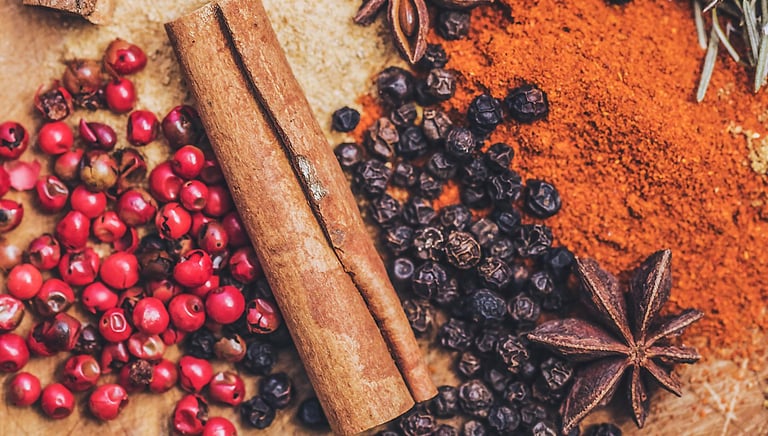 Aromatic Spices: A vibrant collection of culinary spices, including cinnamon sticks, star anise, pep