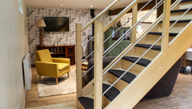 Photographie immobilière présentant un salon intérieur