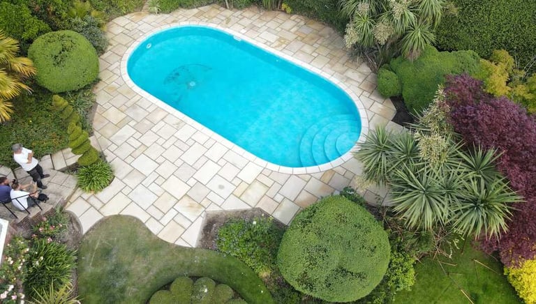 An aerial photograph of a completed swimming pool project