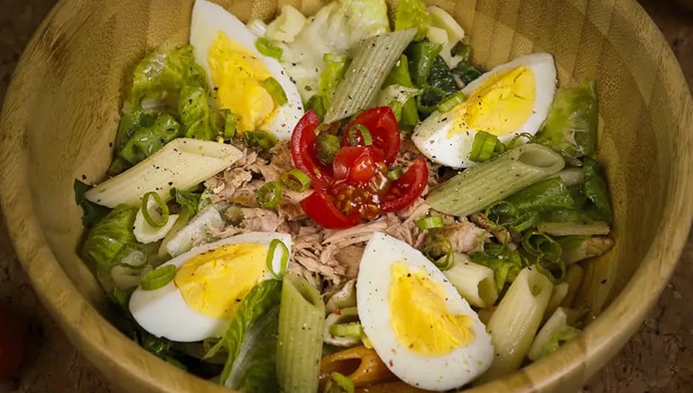 Food Photography - a bowl of food with eggs, tomatoes, and eggs