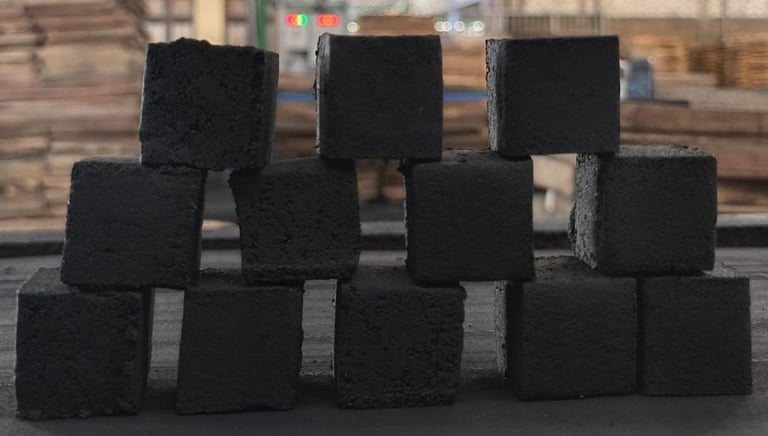 Stack of premium square coconut charcoal briquettes for shisha and BBQ