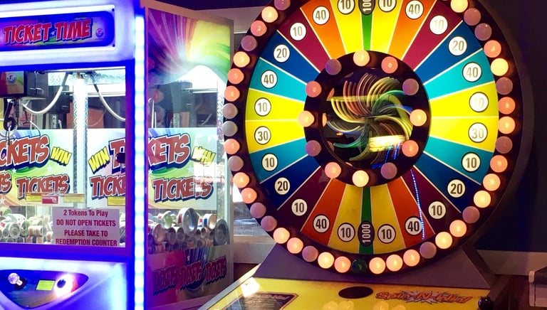 arcade game with wheel and bright lights