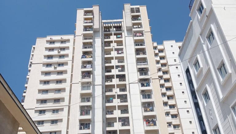 Close-up of a freshly installed pigeon net on an apartment balcony in Bangalore.