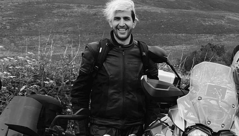 Dan next to his motorcyle