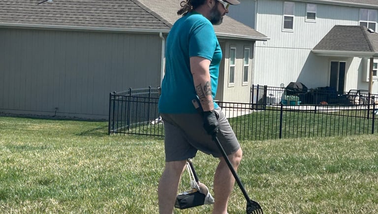 pet-waste-removal-employee-cleaning-clients-yard