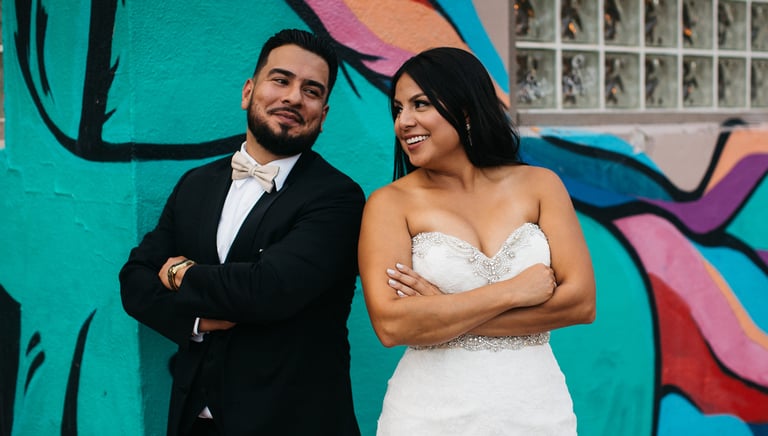 Couple posing during wedding urban