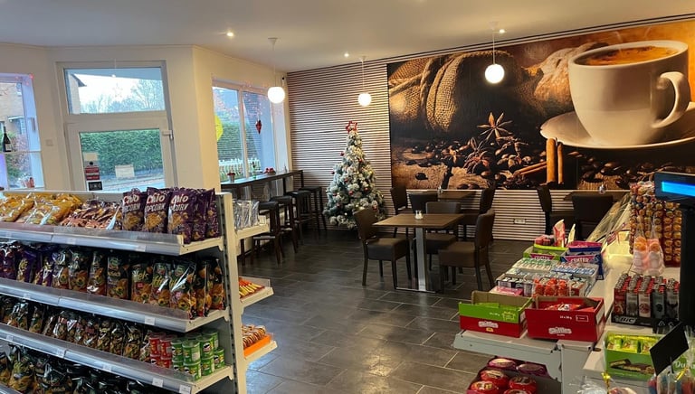 a coffee shop with a coffee shopperfection