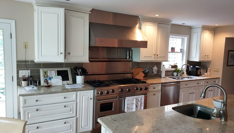 a kitchen with counter top and cabinets