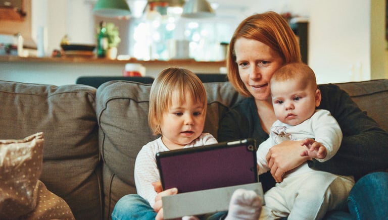 Woman and children are talking on a video call