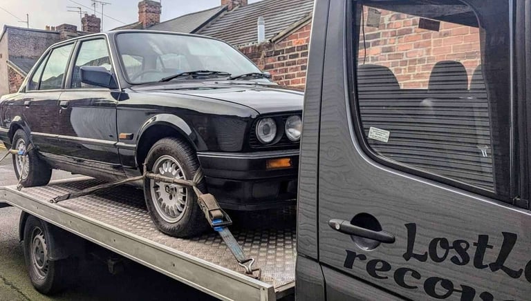 BMW Car on the back of a recovery truck