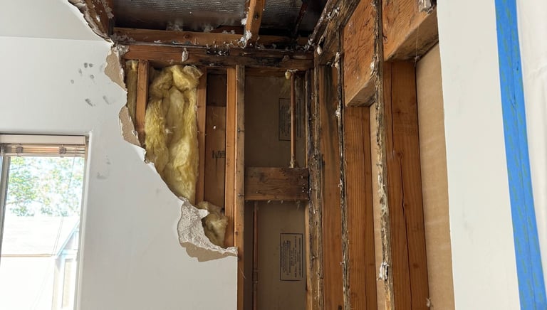 a room with a hole in the ceiling