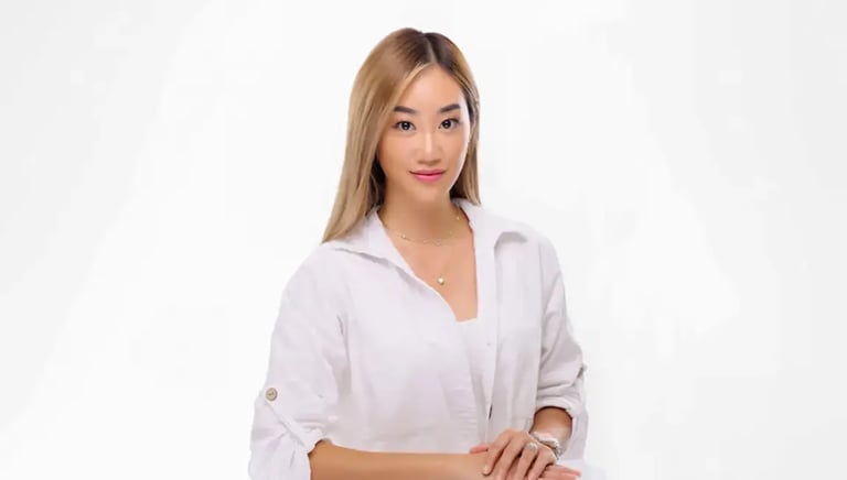 Headshot Photography - a woman in a white shirt and a white shirt