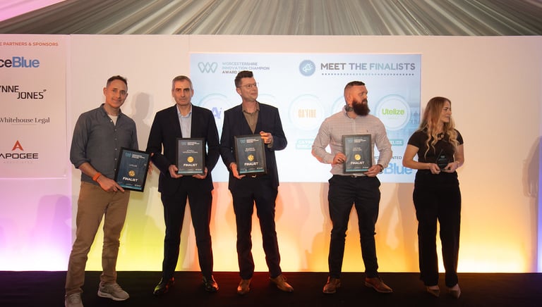 the owner of cafine skincare on stage at Worcestershire Innovation champion awards 2026