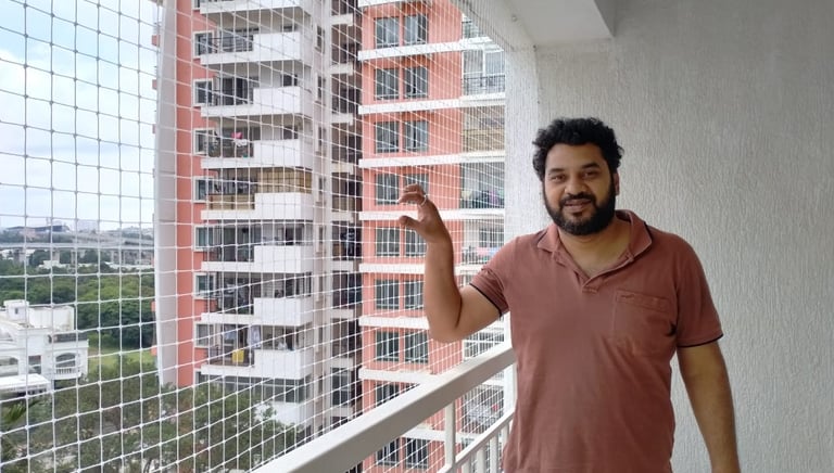 Balcony safety net installed on a high-rise apartment balcony in Cuffe Parade by Arjilli Safety Nets