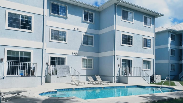 Pool and back yard at Lakeside Cayman Condo