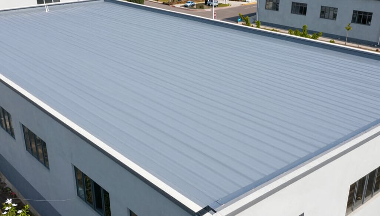 A large commercial building featuring a flat roof with professional roofing materials.