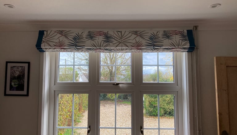 Bespoke roman blind with contrast borders.