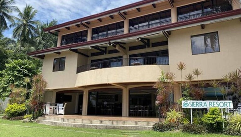 The Pool and gardens at The Sierra Resort ideal to unwind after a day diving