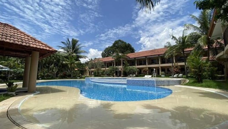 The Pool and gardens at The Sierra Resort ideal to unwind after a day diving