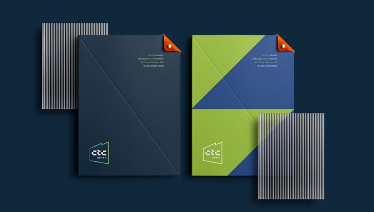 stationery folders with CTC Infra visual identity on a blue background