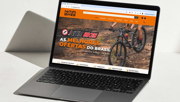 a laptop computer screen showing a website page on the left side of the screen