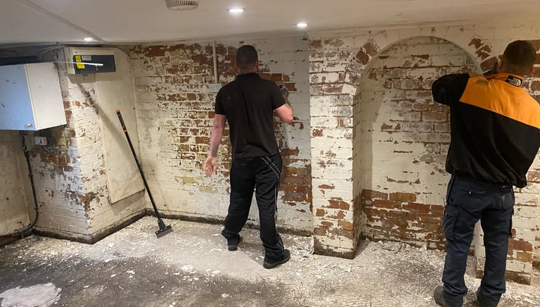 2 general builds workers working on a cella renovation