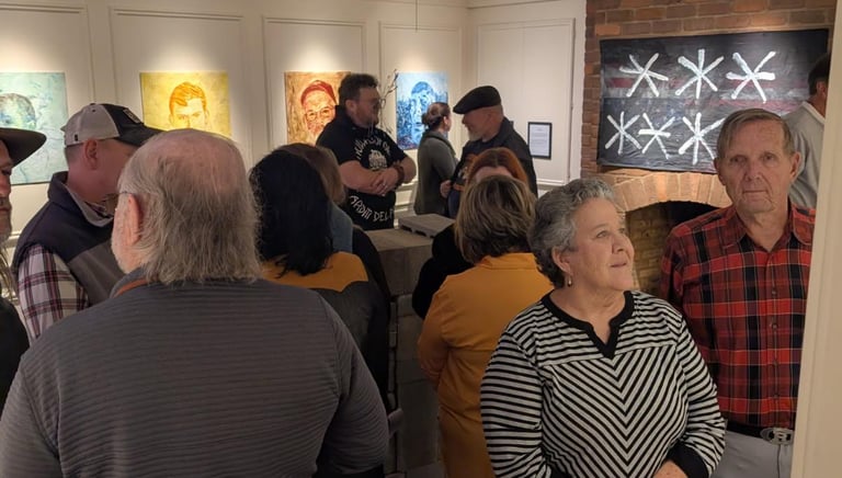 A group of people exploring the opening of the first 2026 gallery, Passports