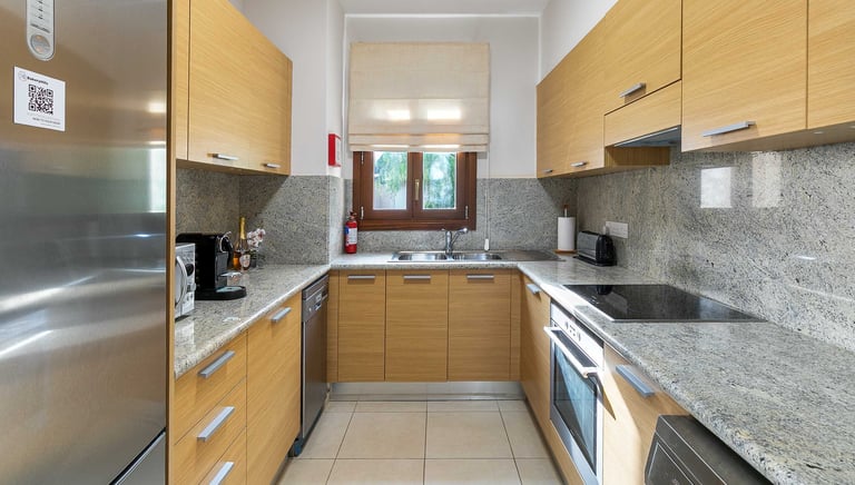 Fully equipped kitchen at Theseus Retreat holiday rental in Aphrodite Hills Resort, Cyprus