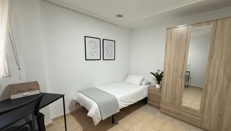 Habitación con cama y habitación moderna