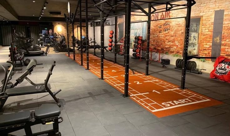 hotel gym space with functional training zone by Luxe Wellness Spaces