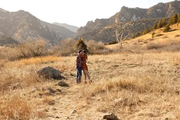 Hiker on Boulder Colorado mountain trail during professional scenic photoshoot