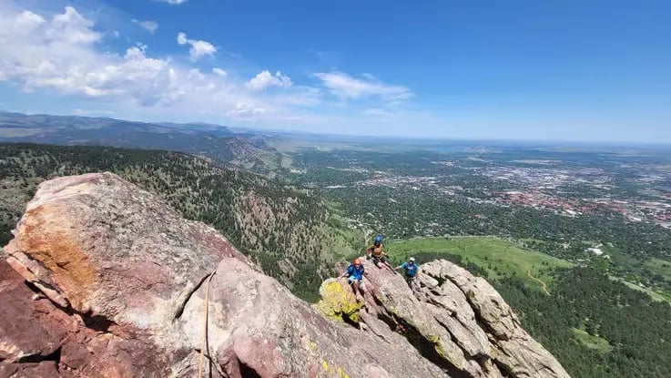 Elevated view of Flatiron sandstone climbing route overlooking Boulder valley Colorado