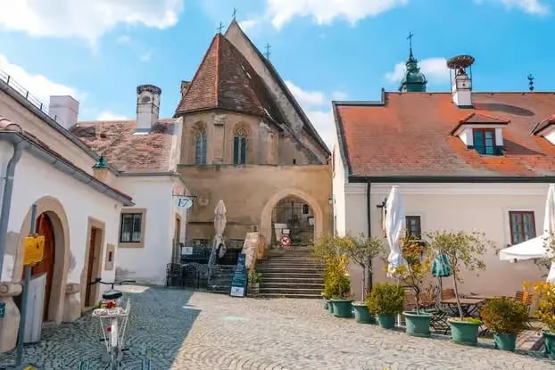 Historic architecture in Innsbruck old town courtyard before starting spring hike Innsbruck outdoor activities in Nordkette
