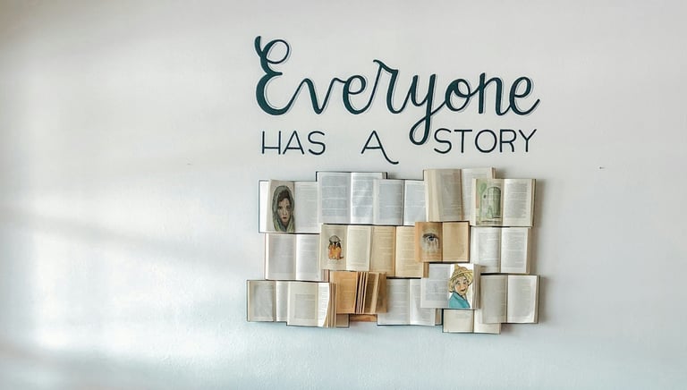 Books displayed beneath the words 'Everyone has a story