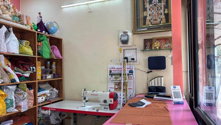 a sewing machine in a room with a pink counter top
