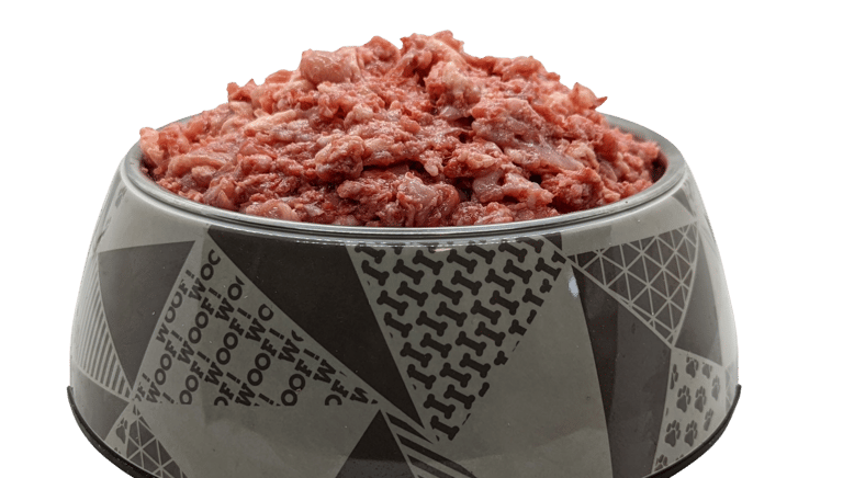 a dog bowl of food with a bowl of food