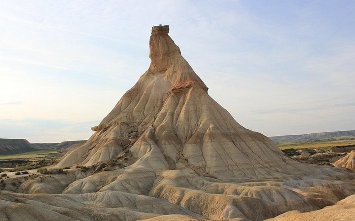 The Castildetierra rock formation rises from the desert landscape of Bardenas Reales Natural Park in Spain.