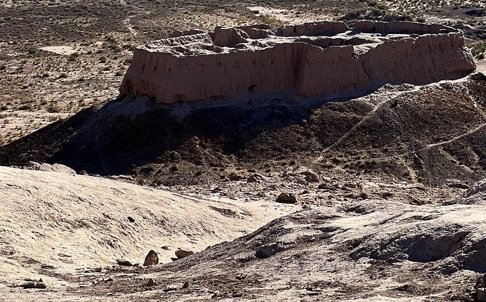 Aerial view of Ayaz Kala, an ancient mud-brick desert fortress and archaeological site in Uzbekistan.