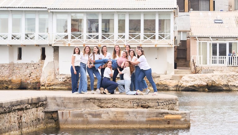 a group of people standing on a dock in Vallon des auffes