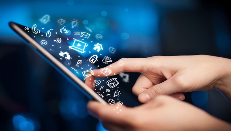 a person holding a cell phone in their hand